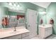 Bathroom with double sinks, large mirror, tile flooring, and a shower at 3953 Lorien Nw Way, Kennesaw, GA 30152