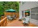Inviting wooden deck featuring outdoor seating and a privacy screen, ideal for relaxing or entertaining at 3953 Lorien Nw Way, Kennesaw, GA 30152