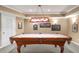 Finished basement game room featuring a high-end pool table and recessed lighting at 3953 Lorien Nw Way, Kennesaw, GA 30152