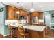 Well-equipped kitchen featuring granite countertops, custom cabinets, and modern appliances for culinary enthusiasts at 3953 Lorien Nw Way, Kennesaw, GA 30152