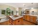Open kitchen featuring an island, granite countertops, stainless steel appliances, and a breakfast nook at 3953 Lorien Nw Way, Kennesaw, GA 30152