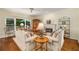 Comfortable living room featuring hardwood floors, a fireplace, and views of the outdoors at 3953 Lorien Nw Way, Kennesaw, GA 30152