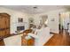 Spacious living room featuring a fireplace, hardwood floors, and an open layout perfect for entertaining at 3953 Lorien Nw Way, Kennesaw, GA 30152