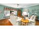 Cozy living room featuring hardwood floors, a decorative fireplace, and stylish furnishings for relaxed living and entertaining at 3953 Lorien Nw Way, Kennesaw, GA 30152