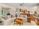 Open-concept living room flowing into the kitchen, featuring hardwood floors and comfortable furnishings at 3953 Lorien Nw Way, Kennesaw, GA 30152