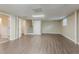 Finished basement with durable flooring, stairs to the upper level, and access to additional rooms at 4016 Nations Dr, Douglasville, GA 30135