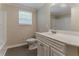 Bathroom featuring a white vanity, toilet, shower and neutral paint and flooring at 4016 Nations Dr, Douglasville, GA 30135