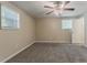 Bedroom showcasing a ceiling fan, neutral walls, and carpet at 4016 Nations Dr, Douglasville, GA 30135