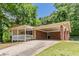 An attached carport that offers seamless access to the home's front entrance at 4016 Nations Dr, Douglasville, GA 30135