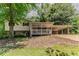 Charming home featuring a covered porch and a convenient carport at 4016 Nations Dr, Douglasville, GA 30135