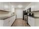 Updated kitchen featuring white cabinetry, sleek countertops, and stainless steel appliances at 4016 Nations Dr, Douglasville, GA 30135
