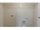 Laundry room boasts convenient hookups, shelving, and ample space for laundry needs at 4016 Nations Dr, Douglasville, GA 30135
