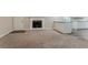 Cozy living room with a charming fireplace and seamless access to the updated kitchen at 4016 Nations Dr, Douglasville, GA 30135