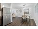 Bright open-concept kitchen and dining area adjacent to the living room at 1386 Pineglen Dr, Riverdale, GA 30296