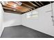 Unfinished room with exposed beams and a bright window at 1386 Pineglen Dr, Riverdale, GA 30296