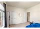 Bedroom with carpet and doors and a large window at 1749 Charcoal Ives Rd, Lawrenceville, GA 30045