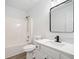 Bathroom featuring a single sink vanity with marble countertop and modern fixtures at 1835 Patrick Mill, Buford, GA 30518