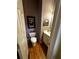 Cozy half bath features wood flooring and decorative wall art, a charming and practical space at 2667 Hampton Park Dr, Marietta, GA 30062