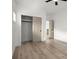 Bright bedroom with modern ceiling fan, neutral paint, and sliding closet door at 32 Wadley Nw St, Atlanta, GA 30314