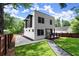 A modern two-story home boasts a well-manicured lawn and sleek architectural design at 32 Wadley Nw St, Atlanta, GA 30314