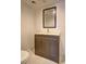 Bathroom featuring a single vanity with modern fixtures and hexagon tile flooring at 4593 Bexley Way, Stone Mountain, GA 30083
