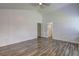 Bedroom showcasing vaulted ceilings, neutral walls, and multiple doors at 4593 Bexley Way, Stone Mountain, GA 30083