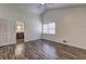Bedroom showcasing vaulted ceilings, new flooring, and an ensuite bathroom at 4593 Bexley Way, Stone Mountain, GA 30083
