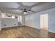 Spacious living room with stairs and hardwood floors at 4593 Bexley Way, Stone Mountain, GA 30083