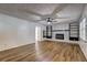 Bright living room with hardwood floors and stylish fireplace at 4593 Bexley Way, Stone Mountain, GA 30083