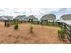 Spacious backyard showcasing a black fence and lush natural surroundings at 98 Heritage Pointe Dr, Villa Rica, GA 30180