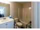 Standard bathroom with shower and tub combo, white toilet, and sink with white cabinets at 98 Heritage Pointe Dr, Villa Rica, GA 30180