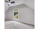 Attic room with large window overlooking the outside at 2055 Timberland Dr, Cumming, GA 30040