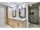 Bathroom featuring a double vanity, modern fixtures, and a walk-in glass shower at 2055 Timberland Dr, Cumming, GA 30040