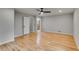 Light-filled bedroom featuring hardwood floors and a door leading to the attached bathroom at 2055 Timberland Dr, Cumming, GA 30040