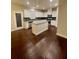 Modern kitchen with white cabinets, stainless steel appliances, and a granite island at 2431 Kingston Heath Way, Marietta, GA 30008