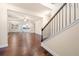 Open-concept living room showcasing hardwood floors and a view of the kitchen at 2431 Kingston Heath Way, Marietta, GA 30008
