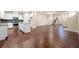 Open floor plan featuring a kitchen with granite counters and stainless steel appliances at 2431 Kingston Heath Way, Marietta, GA 30008