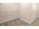Spacious walk-in closet with carpet and metal shelving for storage at 2431 Kingston Heath Way, Marietta, GA 30008