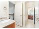 Bathroom features tiled flooring and a granite-topped vanity, conveniently located by an adjacent room at 3512 Centerville Rosebud Rd, Snellville, GA 30039