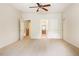 Spacious bedroom featuring neutral carpeting and a ceiling fan, providing a serene retreat at 3512 Centerville Rosebud Rd, Snellville, GA 30039