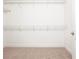 Walk-in closet with ample shelving and carpeting at 3512 Centerville Rosebud Rd, Snellville, GA 30039