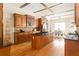 Kitchen featuring wood cabinets, granite countertops, and a center island at 3512 Centerville Rosebud Rd, Snellville, GA 30039