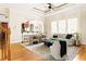 Living room with open floor plan, beamed ceilings and a view to the kitchen at 3512 Centerville Rosebud Rd, Snellville, GA 30039