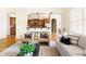 Elegant living room showcasing stylish seating, hardwood floors, and an open view of the kitchen area at 3512 Centerville Rosebud Rd, Snellville, GA 30039