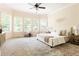Spacious main bedroom with large windows and carpet flooring at 3512 Centerville Rosebud Rd, Snellville, GA 30039