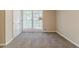 Bedroom with neutral carpet, window with blinds, and white trim at 545 Fayetteville Rd, Fairburn, GA 30213