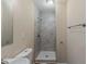 Bathroom featuring tiled shower and marble sink with stainless steel finishes at 733 San Fernando Se Dr, Smyrna, GA 30080