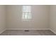Neutral bedroom featuring gray carpet and natural light from the window at 733 San Fernando Se Dr, Smyrna, GA 30080