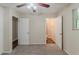 Bedroom featuring gray carpet with bathroom and closet access at 733 San Fernando Se Dr, Smyrna, GA 30080