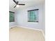 Bedroom with two windows and modern ceiling fan at 2917 Reveille Se Cir, Atlanta, GA 30316